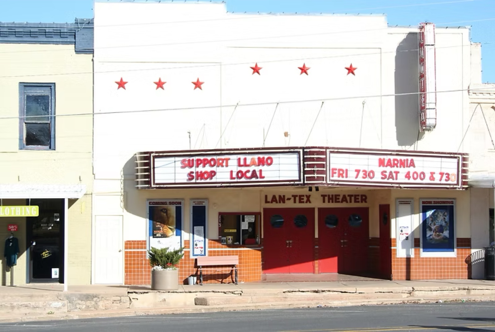 The LanTex's mid-century facade on West Main, red doors under the marquee